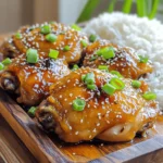 Here are the ingredients you'll need for the honey soy glazed chicken thighs: - 4 bone-in, skin-on chicken thighs - 1/4 cup honey - 1/4 cup soy sauce - 2 tablespoons sesame oil - 2 cloves garlic, minced - 1 tablespoon fresh ginger, minced - 1 teaspoon red pepper flakes (optional for a hint of spice) - 1 tablespoon rice vinegar - 2 green onions, finely chopped (for garnish) - Sesame seeds (for garnish) These ingredients blend together to create a sweet and savory glaze. The honey adds a rich sweetness, while the soy sauce brings depth and umami. You can adjust the red pepper flakes based on your spice level. If you want more heat, feel free to add a bit more! Using fresh ginger and garlic gives the chicken a bright, fresh flavor. This recipe is simple yet packed with taste. You can find the full recipe in the earlier part of the article. Enjoy your cooking! - Combine the honey, soy sauce, sesame oil, minced garlic, minced ginger, and rice vinegar in a medium bowl. - Whisk until smooth and all ingredients blend well. This marinade adds sweet and savory notes to the chicken. - Place the chicken thighs in a resealable bag or a shallow dish. - Pour the marinade over the chicken, making sure every piece is coated. - Seal the bag or cover the dish. Refrigerate for 30 minutes to 4 hours. Longer marinating gives the chicken great flavor. - Preheat your oven to 425°F (220°C). - Remove the chicken from the marinade. Save the marinade for later use. - Place the chicken thighs skin-side up on a lined baking sheet. - Bake for 25-30 minutes. Look for golden, crispy skin. The chicken should reach 165°F (74°C) for safe eating. - While the chicken bakes, take the reserved marinade and pour it into a small saucepan. Bring it to a boil, then simmer for 5-7 minutes to thicken. - After baking, brush the thickened marinade on each chicken thigh. - Return the chicken to the oven for an extra 5 minutes. This step caramelizes the glaze perfectly. - Once done, let the chicken rest for 5 minutes. This helps keep the meat juicy. - Before serving, garnish with chopped green onions and sesame seeds for a nice touch. Enjoy the juicy, tasty flavors of honey soy glazed chicken thighs with this simple recipe! For the full recipe, check the earlier section. To get the best flavor from your chicken thighs, marinate them longer. I suggest at least four hours. This time allows the chicken to soak up all the tasty goodness. If you want a kick, adjust the red pepper flakes. Less for mild heat, more for a spicier dish. To ensure your chicken is cooked just right, use a meat thermometer. The chicken should reach 165°F (74°C). This temperature means it’s safe to eat and juicy. After cooking, let the chicken rest for about five minutes. This rest time helps keep the meat moist and tender. For a stunning plate, serve your glazed chicken on a wide platter. Drizzle any extra marinade over the top. This adds flavor and makes it look nice. Garnish with chopped green onions and sesame seeds. Pair your chicken with steamed rice and colorful vegetables. This combo makes the meal vibrant and appealing. For the full recipe, check the previous section. {{image_4}} You can easily switch up the main protein in this dish. If you prefer chicken breasts, those work well too. They will have a lighter taste but still soak up that yummy honey soy glaze. Drumsticks are another great choice, giving you the same juicy flavor with a fun eating experience. For a vegetarian option, consider using tofu. Tofu absorbs flavors well, making it a tasty substitute. Just press and cube the tofu before marinating it. This will help it soak up all that honey and soy goodness. Want to mix it up? Try adding citrus juice to the marinade. Lemon or lime juice brings a bright, tangy twist that balances the sweetness of the honey. This makes the dish feel fresh and lively. You can also add herbs for extra flavor. Cilantro or parsley can add a nice touch. Sprinkle those on top right before serving for a pop of color and taste. Grilling is a fun way to cook honey soy glazed chicken. It gives the chicken a smoky flavor that pairs well with the glaze. Just marinate and then throw the chicken on the grill until it’s cooked through. If you want tender meat without much fuss, use a slow cooker. Just place the marinated chicken in the cooker and let it do its magic. This method keeps the chicken juicy and full of flavor. For more ideas, check out the Full Recipe for Honey Soy Glazed Chicken Thighs. Store any leftovers in an airtight container. This keeps the chicken fresh for up to 3 days. Always let the chicken cool before sealing it. This helps avoid condensation inside the container. Trust me, fresh chicken tastes much better. You can freeze cooked chicken for later use. Place it in a freezer-safe bag. Remove as much air as possible before sealing. This way, it stays good for up to 3 months. When you’re ready to eat, just thaw in the fridge overnight. For the best texture, reheat in the oven. It keeps the skin crispy, which is key to a great bite. Preheat your oven to 375°F (190°C) and bake for about 10-15 minutes. If you need a quick option, you can use the microwave. Just note, it may lose some crispiness. Enjoy your Honey Soy Glazed Chicken Thighs every way! - Follow the step-by-step instructions provided above for best results. You will mix the marinade, marinate the chicken, and then bake it. Each step helps build flavor and create that tasty glaze. - Yes, but homemade marinade enhances flavor customization. When you make it from scratch, you can adjust the sweetness or saltiness. This gives you control over the taste, making it more personal. - Recommended sides include steamed rice, stir-fried vegetables, or a fresh salad. These sides balance the rich flavors of the chicken. They also add color and nutrition to your plate. This blog covered a tasty Honey Soy Glazed Chicken Thighs recipe. You learned how to create a flavorful marinade, marinate the chicken, and bake it for perfect results. I shared tips for flavor, cooking methods, and serving ideas to elevate your dish. Remember, you can customize this recipe with different proteins or spices. Enjoy making this dish for your next meal. It’s simple, fun, and delicious!