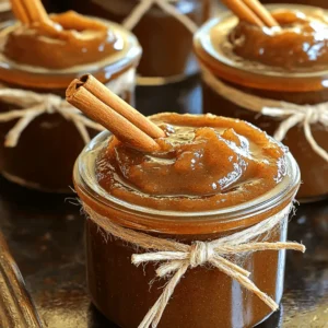 To make this delightful apple butter, gather these simple items: - 6 large apples, peeled, cored, and chopped - 1 cup maple syrup - 1 tablespoon ground cinnamon - 1 teaspoon ground nutmeg - 1/2 teaspoon ground ginger - 1/4 teaspoon sea salt - 1 tablespoon freshly squeezed lemon juice For the best flavor, I suggest using: - Granny Smith: These apples add a tart kick. - Honeycrisp: They offer a sweet and juicy taste. Both types work well together, giving your apple butter depth and balance. If you prefer your apple butter sweeter, consider adding: - 1/2 cup packed brown sugar This is optional. Adjust it based on your taste. You can always start with less and add more as needed. Start by peeling and coring the apples. I suggest using Granny Smith or Honeycrisp apples. These apples provide a great balance of tart and sweet. Chop the apples into small pieces. This helps them cook down faster and blend better. In your slow cooker, place the chopped apples. Add 1 cup of maple syrup for natural sweetness. Then, sprinkle in 1 tablespoon of ground cinnamon, 1 teaspoon of nutmeg, and 1/2 teaspoon of ginger. Don’t forget to add 1/4 teaspoon of sea salt. This enhances the flavor. Finally, pour in 1 tablespoon of freshly squeezed lemon juice. Stir everything well to mix. Cover the slow cooker with its lid. Set it to low heat for 8-10 hours, or high heat for 4-5 hours. This slow cooking makes the apples tender and flavorful. About halfway through, open the lid and stir the mixture. This promotes even cooking and blends the flavors. When the apples break down, use an immersion blender. This will create a smooth texture. If you prefer, you can blend in batches using a countertop blender. Taste your apple butter. If you want it sweeter, mix in some brown sugar. For a thicker apple butter, cook for another hour with the lid off. Let it cool before storing in jars. Enjoy your homemade treat! To get the right texture for your apple butter, blend it well. Start with soft apples; they break down easier. Cook on low for 8-10 hours for a thicker mix. If it's too thin, leave the lid off for the last hour. This lets moisture escape, thickening the butter. Stir often for even cooking, and always taste before serving. An immersion blender is my top choice. It makes blending quick and easy right in the slow cooker. If you don’t have one, use a countertop blender. Just let the mixture cool first to avoid splatters. Blend it in small batches. This way, you get a smooth texture without the mess. You can adjust flavors to your taste. If you like more spice, add extra cinnamon or a pinch of cloves. Want it sweeter? Mix in more brown sugar or maple syrup until you’re happy. A splash of vanilla can also brighten the flavor. Experiment with what you like best! {{image_4}} You can change the spices to suit your tastes. Try adding cloves for warmth or allspice for depth. A pinch of cardamom can also add a nice twist. Experiment to find your favorite mix. Just remember, a little goes a long way! If you prefer less maple syrup, consider honey or agave nectar. These sweeteners add their own flavors. You can use brown sugar alone for a deeper sweetness. Always taste as you go to find the right balance, especially if you adjust the sweeteners. Apple butter is versatile and pairs well with many foods. Spread it on toast or muffins for breakfast. It also complements meats like pork or chicken. You can even stir it into oatmeal or yogurt for added flavor. Try using it in baking, like in cakes or cookies, for a sweet surprise. After you make your slow cooker maple cinnamon apple butter, cool it to room temp. Once cool, transfer the apple butter into clean jars or airtight containers. Store it in the fridge. It will keep fresh for up to 2 weeks. Always use a clean spoon when scooping it out to avoid spoilage. If you want to keep your apple butter longer, consider canning it. Fill sterilized jars with the hot apple butter, leaving some space at the top. Seal tightly and process in a water bath for about 10 minutes. This method can extend its shelf life for up to a year. Homemade apple butter lasts about 2 weeks in the fridge. In sealed jars from canning, it can last up to a year. Always check for signs of spoilage before using. If you see mold or an off smell, it's best to discard it. Use your apple butter on toast, pancakes, or as a filling in baked goods for a tasty treat! Yes, you can use different types of apples. I recommend Granny Smith or Honeycrisp. They add a nice balance of sweet and tart flavors. Other varieties like Fuji or Gala can also work well. Just remember, the taste may change slightly based on the apples you choose. You can store apple butter in the refrigerator for up to 2 weeks. Make sure to keep it in an airtight container. For longer storage, use canning methods to preserve it for several months. Just ensure the jars are sealed properly for safety. There are many great uses for leftover apple butter. Spread it on toast, pancakes, or muffins. You can also mix it into yogurt or oatmeal for added flavor. It makes a great topping for ice cream too. The options are endless! Yes, you can freeze apple butter. Pour it into airtight containers, leaving space at the top for expansion. It can last in the freezer for up to a year. When you’re ready to use it, thaw it in the fridge overnight. Yes, this recipe is suitable for canning. Follow safe canning practices to ensure it is preserved correctly. Use sterilized jars and process in a water bath. This way, you can enjoy your apple butter for many months ahead. You learned about the key ingredients for apple butter, including varieties and optional sweeteners. We discussed step-by-step instructions for preparation and cooking. Tips for perfecting texture and flavor enhancements rounded out the guide. Finally, we covered variations, storage methods, and FAQs. With all this, you can make tasty apple butter with ease. Get creative, and enjoy sharing it with friends and family!