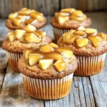 - 2 cups all-purpose flour - 1 cup granulated sugar - 1 tablespoon baking powder - 1 teaspoon baking soda - ½ teaspoon salt - 1 teaspoon ground cinnamon - 1 cup apple cider - ½ cup vegetable oil - 2 large eggs - 1 teaspoon vanilla extract - 1 cup diced Granny Smith apples (or your favorite tart apple) - ½ cup caramel sauce (store-bought or homemade) - Optional: extra caramel sauce for drizzling You can swap all-purpose flour with whole wheat flour for a nutty flavor. Use brown sugar instead of granulated sugar for a richer taste. If you need a dairy-free option, replace vegetable oil with melted coconut oil. Applesauce can work in place of eggs for a vegan version. When choosing apples, look for firm and shiny ones. Granny Smith apples are tart and perfect for this recipe. For apple cider, pick a brand with no added sugars or preservatives. Fresh spices can make a big difference, so check the date on your ground cinnamon. Always use high-quality caramel sauce for the best flavor. To start, preheat your oven to 350°F (175°C). This is key for getting the muffins to rise nicely. Next, get your muffin tin ready. You can line it with paper liners or grease it with cooking spray. This helps the muffins come out easily. In a large bowl, combine the dry ingredients. Add the flour, sugar, baking powder, baking soda, salt, and ground cinnamon. Use a whisk to mix them well. This ensures an even flavor throughout. In another bowl, mix the wet ingredients. Whisk together the apple cider, vegetable oil, eggs, and vanilla extract. Make sure this mixture is smooth. Then, pour the wet ingredients into the dry mix. Stir gently with a spatula or wooden spoon until combined. Don’t overmix; this keeps the muffins light and fluffy. Now, fold in the diced apples. Make sure they are spread evenly through the batter. Then, fill each muffin cup with about 2 tablespoons of batter. Leave some space at the top for rising. Use a teaspoon to add caramel sauce in the center of each muffin. Top it off with another tablespoon of batter to cover the caramel. This gives a surprise inside each muffin. Repeat this until all muffin cups are filled. When mixing, always use gentle strokes. This helps keep air in the batter, making your muffins fluffy. If you overmix, the muffins can be tough. Mix until just combined, then fold in your apples. To fold, use a spatula and scoop from the bottom. Turn the batter over, bringing dry ingredients up from the bottom. Do this lightly. You want to see some flour still, which is okay. Place the muffin tin in your preheated oven. Bake for 18-22 minutes. Check for doneness by inserting a toothpick into the center. If it comes out clean, your muffins are ready. After baking, let the muffins cool in the tin for about 5 minutes. Then, carefully move them to a wire rack. This cooling step helps keep them soft. For a fun twist, drizzle extra caramel sauce over the muffins once they cool. This adds a nice touch and extra sweetness. Enjoy your baking! To keep your muffins light, don't overmix the batter. When you combine wet and dry ingredients, mix just until you see no dry flour. Bubbles in the wet mix are good. They help the muffins rise! Another tip is to measure your flour correctly. Too much flour makes muffins heavy. Use a spoon to fill your measuring cup, then level it off. Store your muffins in an airtight container. This keeps them fresh and moist. If you want to keep them longer, freeze them! Wrap each muffin in plastic wrap, then place them in a freezer bag. They can last up to three months. To enjoy, thaw them overnight in the fridge or microwave them for a quick treat. For a great caramel sauce, start with sugar in a heavy pot. Heat it slowly over medium heat. Stir gently until it melts into a golden syrup. If you want a richer taste, add butter and cream once the sugar is melted. Be careful not to burn it! Homemade caramel can elevate your muffins. Use it warm for a delicious drizzle on top of your muffins. {{image_4}} You can boost the taste of your muffins in fun ways. Adding nuts like walnuts or pecans gives a nice crunch. They also add healthy fats. You might try spices like nutmeg or ginger for a warm flavor. A pinch of cardamom can also make your muffins more special. Don’t be afraid to change things up! If you need a gluten-free version, swap the all-purpose flour for a gluten-free blend. Make sure it has a binding agent. For a vegan option, use flax eggs instead of real eggs. Mix one tablespoon of ground flax with three tablespoons of water. Let it sit until it thickens. Use plant-based milk in place of apple cider for more flavor. You can switch things up based on the season. In fall, try pears instead of apples for a change. Pears add sweetness and moisture. In spring, you could add berries for a fruity twist. Each season brings new flavors, so feel free to experiment. This way, you can enjoy these muffins all year long! To keep your Apple Cider Caramel Coffee Cake Muffins fresh, store them in an airtight container. This prevents air from making them dry. If you wish to keep them longer, wrap each muffin in plastic wrap first. You can then place them in a resealable bag. This method helps keep in moisture and flavor. When stored properly at room temperature, these muffins can last for about 2 to 3 days. If you place them in the fridge, they can stay fresh for about a week. For longer storage, consider freezing them. They can last in the freezer for up to 3 months. Just make sure to thaw them at room temperature before enjoying. To enjoy your muffins warm, reheating is key. You can use a microwave for quick results. Heat each muffin for about 10 to 15 seconds. If you prefer, you can warm them in the oven. Set the oven to 350°F (175°C) and heat them for 5 to 10 minutes. This will bring back their fresh-baked taste. Drizzle some extra caramel sauce on top before serving for an extra treat! Yes, you can prepare these muffins ahead of time. You can bake them a day in advance. Store them in an airtight container to keep them fresh. If you want to freeze them, wrap each muffin tightly in plastic wrap. This keeps them tasty for up to three months. When ready to eat, just thaw them in the fridge overnight. You can warm them in the oven or microwave for a few seconds. If you don’t have apple cider, you can use apple juice as a substitute. It gives a similar flavor, but it will be a bit sweeter. Another option is to mix water with a bit of lemon juice. This combination mimics the tartness of cider. You can also use unsweetened applesauce, but reduce the oil in your recipe because applesauce adds moisture. To help your muffins rise higher, make sure your baking powder is fresh. Old baking powder may not work well. Also, don’t overmix the batter. Mixing too much can make muffins dense. Fill the muffin cups only halfway, so they have room to rise. Lastly, preheat your oven properly. A hot oven helps the muffins rise quickly, making them light and fluffy. In this blog post, I shared key ingredients and their measurements. You learned about substitutes and how to pick fresh items. You also got step-by-step instructions for preparation, mixing, and baking times. I provided tips to avoid dense muffins and store them well. You found variations, including gluten-free and seasonal options. Finally, I explained storage techniques and answered common questions. Enjoy your baking journey, and remember: fresh ingredients make all the difference!