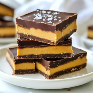To make vegan chocolate peanut butter fudge, gather these simple and tasty ingredients: - 1 cup natural peanut butter (creamy or chunky) - 1/2 cup pure maple syrup - 1/4 cup coconut oil, melted until liquid - 1/2 cup unsweetened cocoa powder - 1 teaspoon pure vanilla extract - 1/4 teaspoon fine sea salt - 1/2 cup dairy-free dark chocolate chips - Optional: chopped nuts (e.g., walnuts or almonds) or a sprinkle of sea salt for topping These ingredients come together to create a rich and creamy fudge. Natural peanut butter adds flavor and creaminess. Maple syrup gives sweetness, while coconut oil adds smoothness. Cocoa powder brings that deep chocolate taste. The vanilla extract adds a lovely aroma, and sea salt balances the flavors. Feel free to customize your fudge with toppings. Chopped nuts add crunch, and sea salt enhances the sweet taste. This recipe is simple and delicious, perfect for any occasion! {{ingredient_image_2}} 1. Mixing the peanut butter, maple syrup, and coconut oil Start with a medium bowl. Add 1 cup of natural peanut butter, 1/2 cup of pure maple syrup, and 1/4 cup of melted coconut oil. Use a spatula or whisk to blend until smooth and creamy. Make sure there are no lumps. This step creates a rich base for your fudge. 2. Sifting and combining the cocoa powder, vanilla extract, and sea salt Next, sift 1/2 cup of unsweetened cocoa powder over your peanut butter mix. Add 1 teaspoon of pure vanilla extract and 1/4 teaspoon of fine sea salt. Mix well until everything combines into a dark chocolate batter. This adds depth to the flavor. 3. Folding in the dairy-free chocolate chips Now, gently fold in 1/2 cup of dairy-free dark chocolate chips. Make sure they are spread evenly throughout the mixture. Each bite will have a nice burst of chocolate, enhancing your fudge experience. These steps are simple yet crucial for making delicious vegan chocolate peanut butter fudge. Enjoy the process! To make the smoothest fudge, start by mixing the peanut butter, maple syrup, and coconut oil well. Use a whisk or spatula. Ensure there are no lumps. This step sets the base for a creamy texture. For high-quality ingredients, I recommend natural peanut butter, like Justin's or Smucker's. Their flavor shines through, enhancing your fudge. For maple syrup, go for grade A or B for richer taste. Adjusting sweetness is easy. If you want sweeter fudge, add more maple syrup. Start with a tablespoon at a time. Taste as you go to find your perfect balance. Feel free to experiment! You can add a pinch of cinnamon or even a splash of almond extract. These small changes can elevate your fudge and make it uniquely yours. Pro Tips Choose Your Peanut Butter Wisely: Opt for natural peanut butter without added sugars or oils for the best flavor and texture. Mind the Cocoa Powder: Use high-quality unsweetened cocoa powder to achieve a rich chocolate flavor that enhances the fudge. Cutting Techniques: For clean cuts, warm your knife slightly before slicing the fudge, which will help prevent it from sticking. Storage Tips: Keep the fudge refrigerated in an airtight container to maintain its freshness, and consider freezing for longer storage. {{image_4}} You can easily make this vegan chocolate peanut butter fudge your own. Here are some fun ideas! - Swapping chocolate types: You can use milk chocolate chips if you want a sweeter taste. Dark chocolate chips give a richer flavor. Choose what you like best. - Adding flavor extracts: Want a twist? Try adding a splash of almond or mint extract. Just a tiny bit can change the whole flavor. - Incorporating dried fruits or seeds: Dried fruits like cranberries or raisins add a nice chew. You can mix in seeds like chia or hemp for extra crunch and nutrition. Feel free to get creative! Each change can make your fudge fun and unique. To keep your vegan chocolate peanut butter fudge fresh, use an airtight container. This helps stop air from getting in and keeps the fudge tasty. You can store the fudge in the fridge for up to one week. If you want it to last longer, freeze it! Just make sure to separate layers with parchment paper. This way, you won&rsquo;t have a solid block of fudge. To keep your fudge fresh for a long time, check these tips: - Cut the fudge into squares before storing. This makes it easy to grab one when you want a treat. - Avoid moisture. Make sure the container is dry before you add the fudge. - Keep the fudge away from strong-smelling foods in your fridge. Fudge can absorb flavors, and we want it to taste like chocolate and peanut butter, not onions! Following these storage tips will help you enjoy your fudge for days! Yes, you can make this fudge nut-free. Simply use sun butter or soy nut butter. These options work well and keep the fudge creamy. Yes, this fudge is gluten-free. All the ingredients are naturally gluten-free. Just check labels to be sure. You can tell the fudge is set by touch. It should feel firm and not sticky. If it feels soft, give it more time in the freezer. Yes, you can add protein powder. Start with one tablespoon and mix well. This will make your fudge a bit thicker, but still tasty! This blog post covered how to make delicious fudge using simple ingredients. You learned about the key elements like natural peanut butter and cocoa powder. I shared tips to ensure a smooth finish and options for custom flavors. Proper storage methods help your fudge last longer, too. Now, you have the tools to create your own special fudge at home. Enjoy making and sharing your tasty treats!